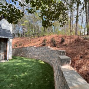 Beautiful backyard retaining wall with drainage built in - Roswell GA The Ricks Group Company