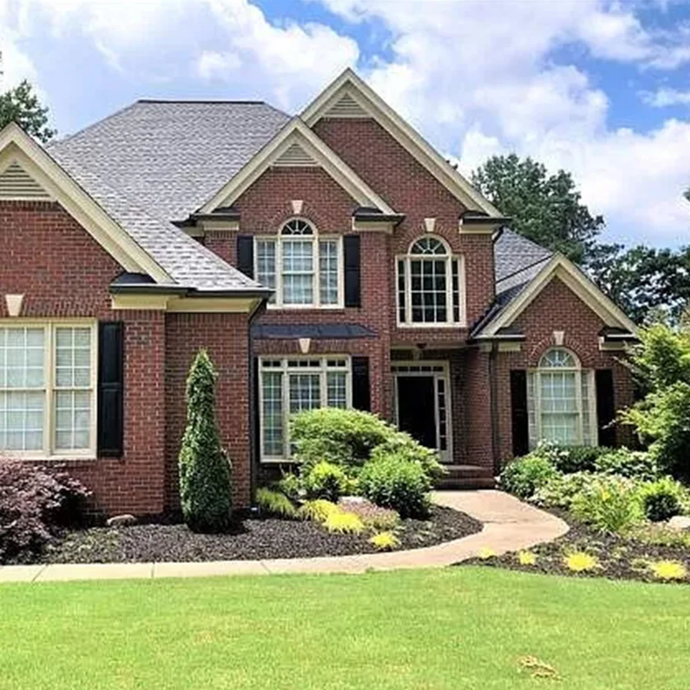 Superior Duluth Georgia landscapers design, installation and maintenance services at luxury two story brick residence